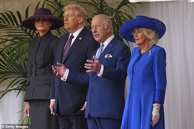 Mr Trump and the King wait to review the Guard of Honour at Windsor Castle this afternoon