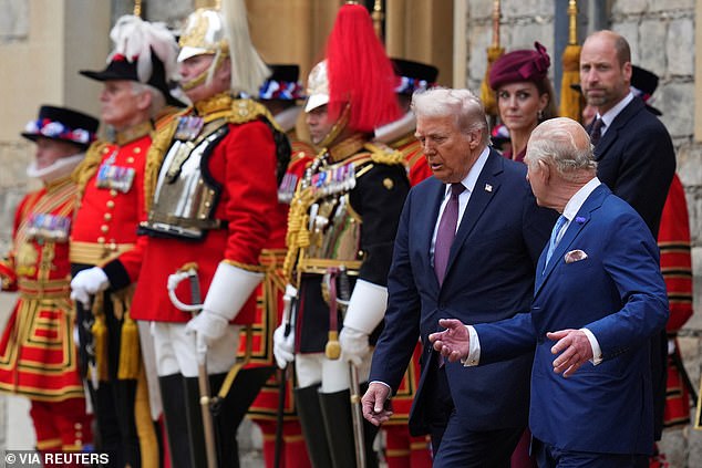 King Charles III and US President Donald Trump review the guard of honour at Windsor Castle