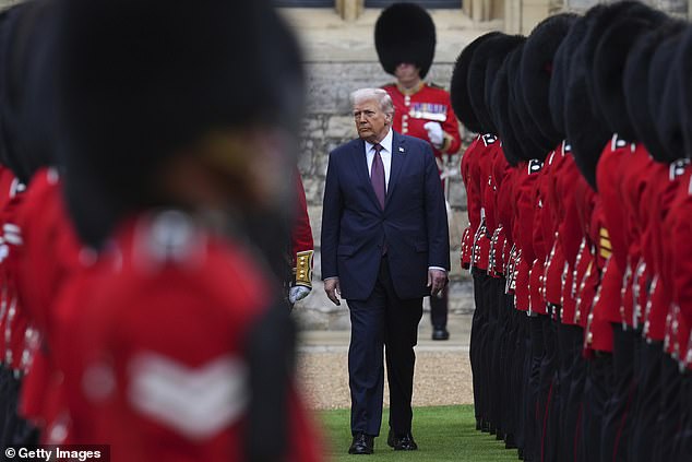 King Charles III and US President Donald Trump review the guard of honour at Windsor Castle