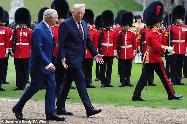 King Charles III and US President Donald Trump review the guard of honour at Windsor Castle,