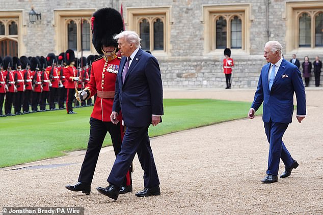 King Charles III and US President Donald Trump review the guard of honour at Windsor Castle,