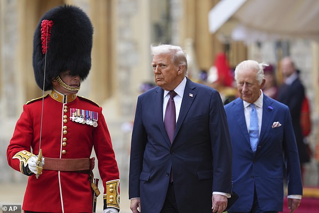 King Charles III and US President Donald Trump review the guard of honour at Windsor Castle,