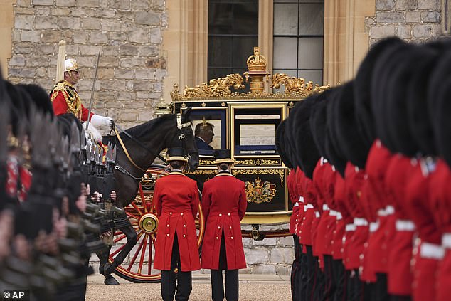 President Donald Trump and King Charles III arrive in the Irish State Coach at Windsor today