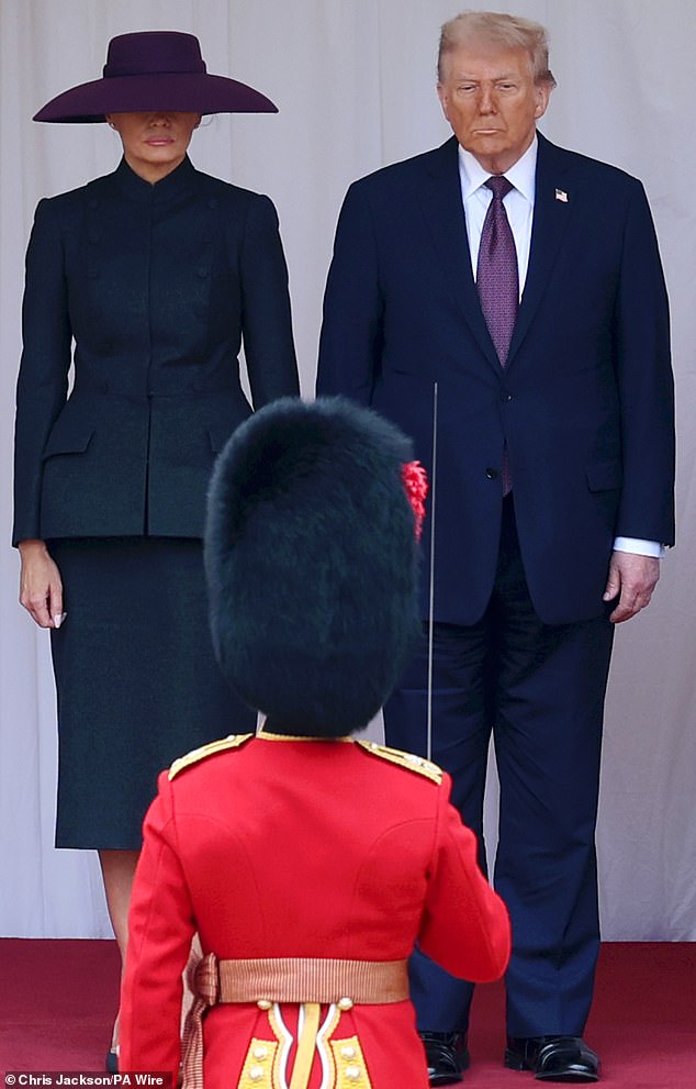 First Lady Melania Trump and President Donald Trump review the guard of honour during the ceremonial welcome at Windsor Castle