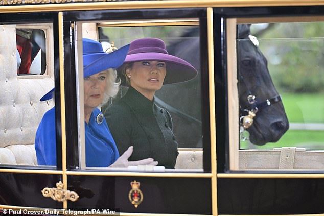 Queen Camilla and Melania Trump during today's carriage procession in Windsor