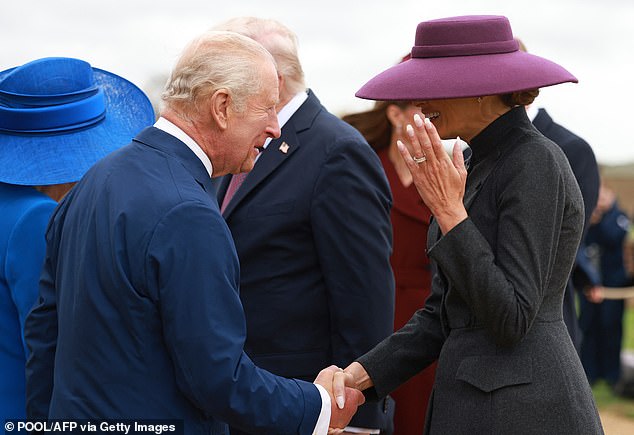 Britain's King Charles III shakes hands with US First Lady Melania Trump in Windsor today