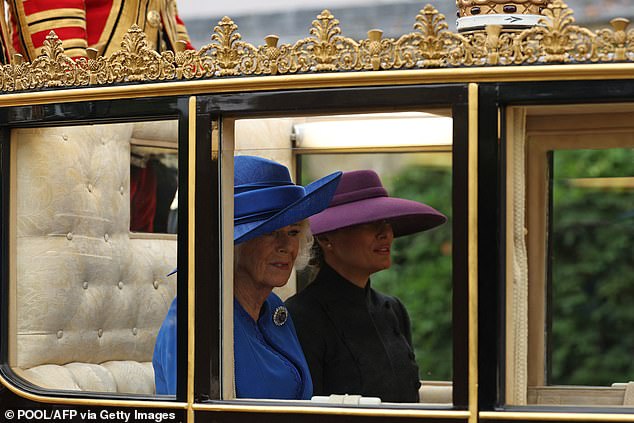Queen Camilla and Melania Trump during today's carriage procession in Windsor
