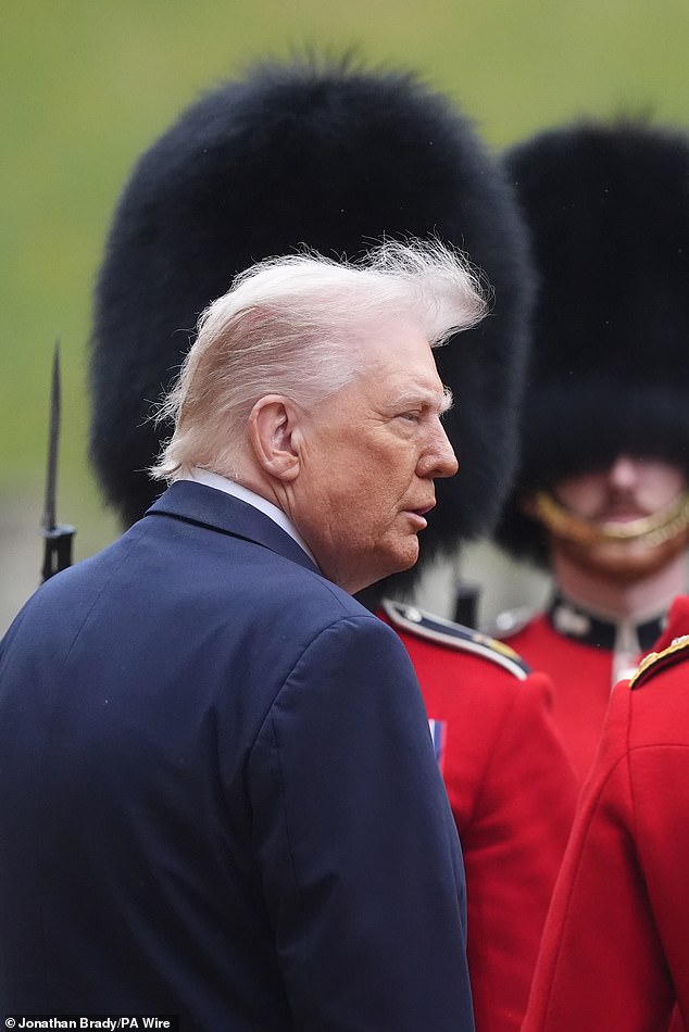King Charles III and US President Donald Trump review the guard of honour at Windsor Castle