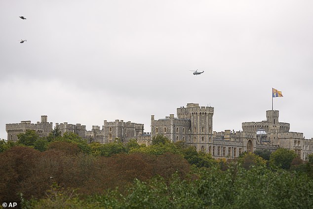 A helicopter carrying Donald and Melania Trump arrives at Windsor Castle this afternoon