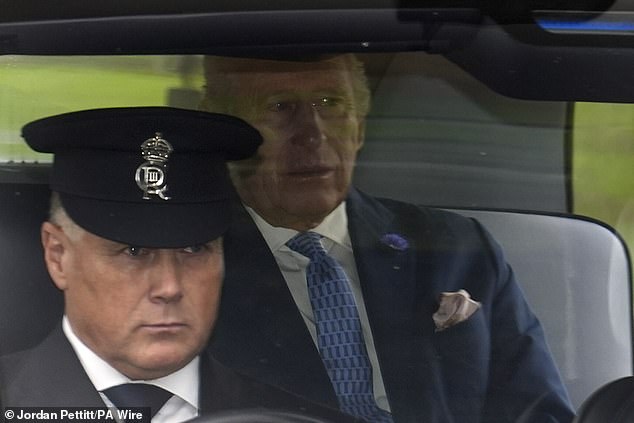 King Charles III arrives ahead of the carriage procession to Windsor Castle this afternoon