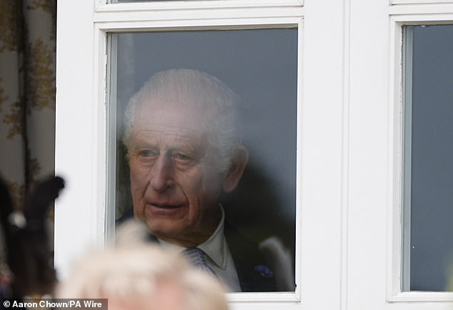 King Charles III arrives ahead of the carriage procession to Windsor Castle this afternoon