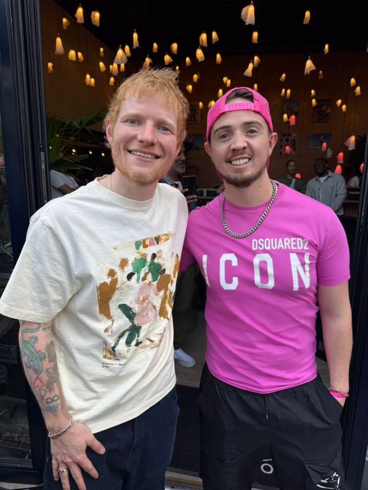 Ed Sheeran and Jack Hardwick smiling for a photo.