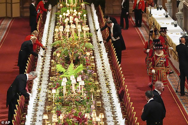 Preparations are made ahead of a state banquet at Windsor Castle