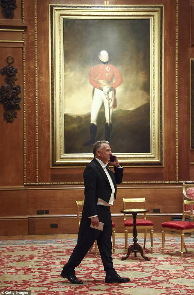 White House Special Envoy Steve Witkoff speaks on the phone before the state banquet