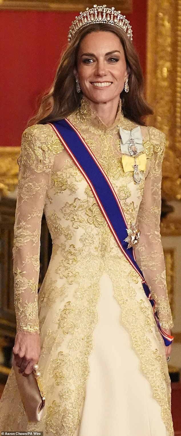 Kate Middleton (pictured) wore a Phillipa Lepley silk crepe gown underneath a hand-embroidered gold Chantilly lace evening coat for the banquet