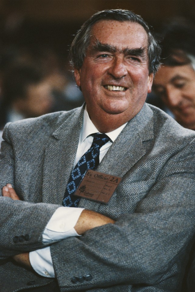 British Labour politician Denis Healey smiling at the annual party conference.