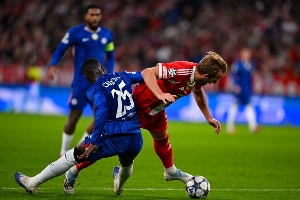 Harry Kane of FC Bayern Munich in action with Moises Caicedo of Chelsea FC.