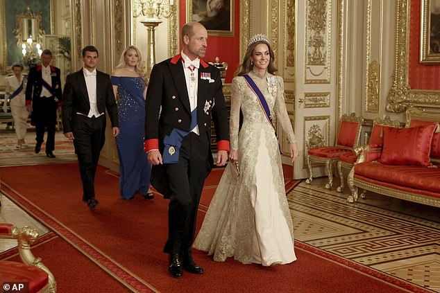Princess Kate (right) and Prince William (center) arrive at Wednesday night's state banquet at Windsor Castle followed by Tiffany Trump (second from left) and her husband Michael Boulos (left)