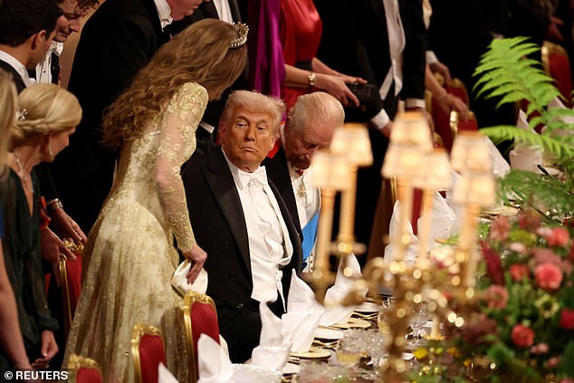 US President Donald Trump looks at Princess Catherine at the State Banquet