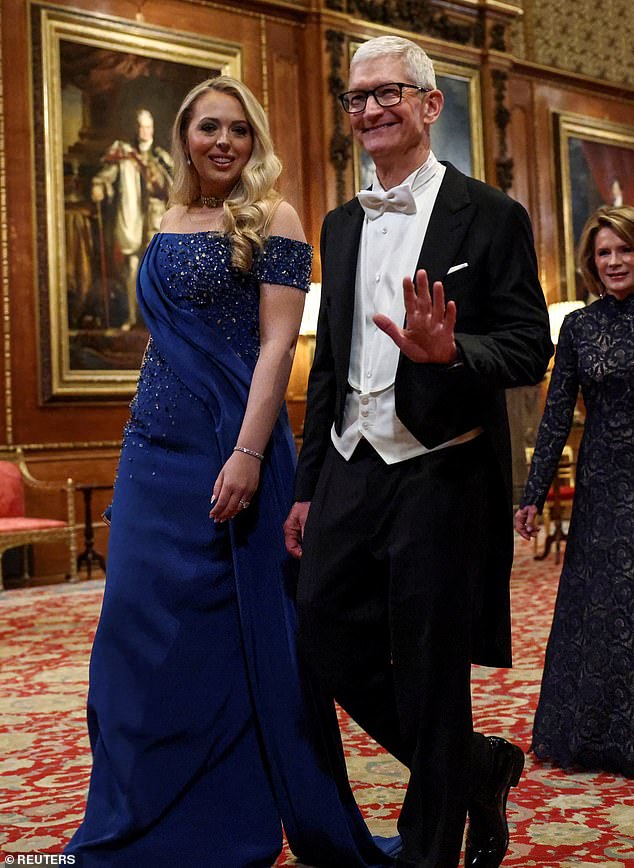 Apple CEO Tim Cook walks to attend the State Banquet at Windsor Castle, in Windsor, Britain, September 17, 2025. REUTERS/Kevin Lamarque/Pool