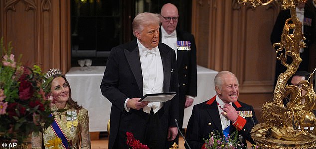 U.S. President Donald Trump delivers his speech as Britain's King Charles and Kate, Princess of Wales, listen during the State Banquet in Windsor Castle, England, on day one of U.S. President Donald Trump and First Lady Melania Trump's second state visit to the UK, Wednesday Sept. 17, 2025. (Yui Mok/PA via AP, Pool Photo via AP)