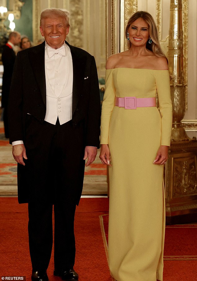 U.S. President Donald Trump and first lady Melania Trump pose for a photo at the State Banquet during U.S. President Donald Trump's state visit, at Windsor Castle, in Windsor, Britain, September 17, 2025. REUTERS/Phil Noble/Pool