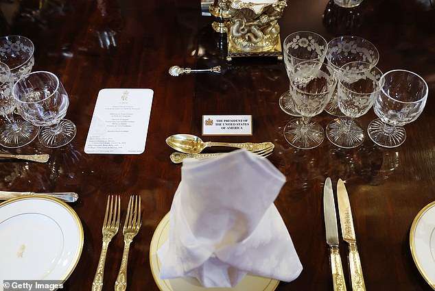 WINDSOR, ENGLAND - SEPTEMBER 17: The table setting for U.S. President Donald Trump is seen ahead of a state banquet in St. Georges Hall at Windsor Castle on September 17, 2025 in Windsor, England. President Trump is in England from Sept. 16-18 on his second UK state visit, with the previous one taking place in 2019 during his first presidential term. (Photo by Anna Moneymaker/Getty Images)