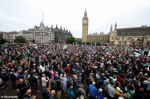 Demonstrators gather at the Parliament Square as they take part in a 'Trump Not Welcome' rally during the state visit of U.S. President Donald Trump and first lady Melania Trump, in London, Britain, September 17, 2025. REUTERS/Hannah McKay