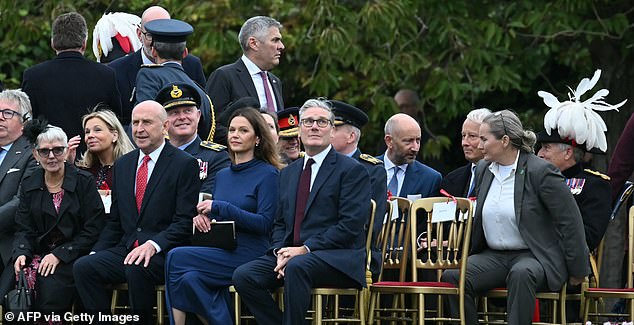 Britain's Prime Minister Keir Starmer (C) and his wife Victoria Starmer (CL) watch the Beating Retreat military ceremony on the East Lawn at Windsor Castle, in Windsor, on September 17, 2025, during the US president's second State Visit. US President Donald Trump arrived in Britain for an unprecedented second State Visit, with the UK government rolling out a royal red carpet welcome to win over the mercurial leader. (Photo by ANDREW CABALLERO-REYNOLDS / AFP) (Photo by ANDREW CABALLERO-REYNOLDS/AFP via Getty Images)