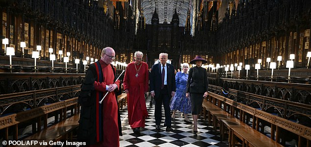 US President Donald Trump (C) and US First Lady Melania Trump (R) tour the quire of St George's Chapel with Chapter Clerk Charlotte Manley (2R) and Dean of Windsor Christopher Cocksworth (2L) at Windsor Castle, in Windsor, on September 17, 2025, during the US president's second State Visit. US President Donald Trump arrived in Britain for an unprecedented second State Visit, with the UK government rolling out a royal red carpet welcome to win over the mercurial leader. (Photo by ANDREW CABALLERO-REYNOLDS / POOL / AFP) (Photo by ANDREW CABALLERO-REYNOLDS/POOL/AFP via Getty Images)