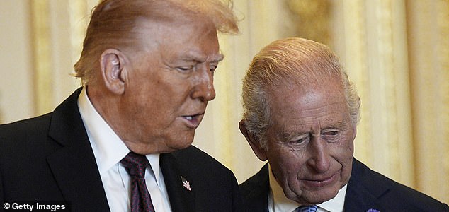 WINDSOR, ENGLAND - SEPTEMBER 17: US President Donald Trump (L) and King Charles III view items on display during a visit to the Royal Collection exhibition, in the Green Drawing Room during the State visit by the President of the United States of America at Windsor Castle on September 17, 2025 in Windsor, England. (Photo by Aaron Chown - WPA Pool/Getty Images)