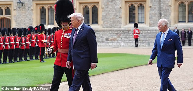 King Charles III (right) and US President Donald Trump review the guard of honour during the ceremonial welcome at Windsor Castle, Berkshire, on day one of the president's second state visit to the UK. Picture date: Wednesday September 17, 2025. PA Photo. Photo credit should read: Jonathan Brady/PA Wire
