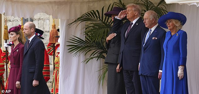 President Donald Trump salutes as he stands beside Britain's King Charles III and Queen Camilla with Melania Trump on the left as Britain's Kate and Prince William listen on the far left during the national anthem at Windsor Castle in Windsor, England, Wednesday, Sept. 17, 2025.(AP Photo/Kirsty Wigglesworth, Pool)