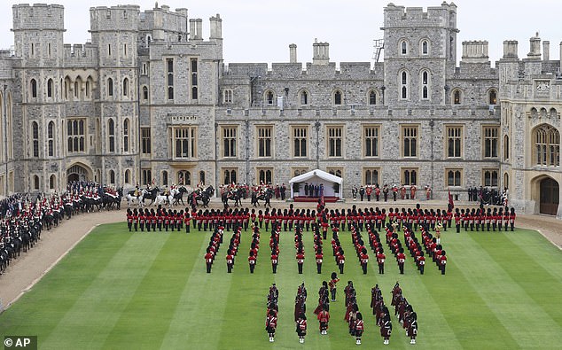 Britain's Kate, Princess of Wales, Prince William, first lady Melania Trump, President Donald Trump, Britain's King Charles III and Queen Camilla review the Guard of Honour at Windsor Castle in Windsor, England, Wednesday Sept. 17, 2025. (Chris Jackson/Pool Photo via AP)