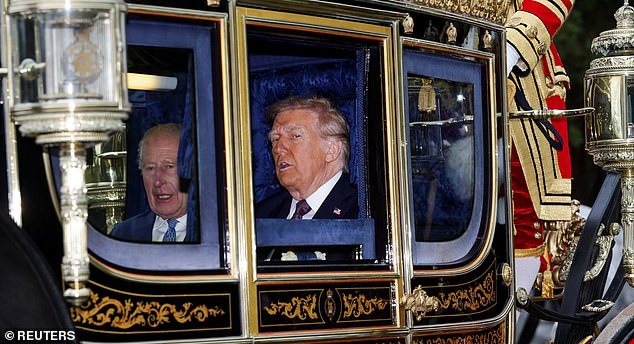 Britain's King Charles and U.S. President Donald Trump sit in a carriage during a procession through Windsor Castle, in Windsor, Britain, September 17, 2025. REUTERS/Toby Melville/Pool