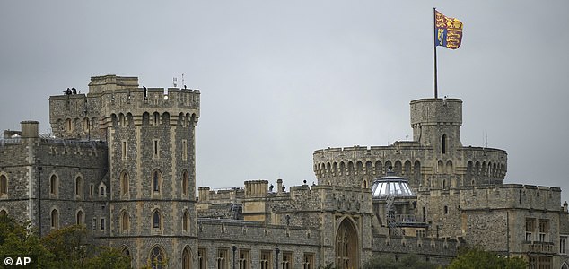 Security forces stand on the roof of Windsor Castle in Windsor, England, Wednesday, Sept. 17, 2025 ahead of the arrival of President Donald Trump and first lady Melania Trump .(AP Photo/Alastair Grant)