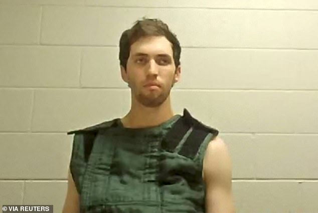 Investigators said Kirk's alleged shooter Robinson (pictured during his video court appearance on September 16) held far-left ideologies and was dating his transgender roommate