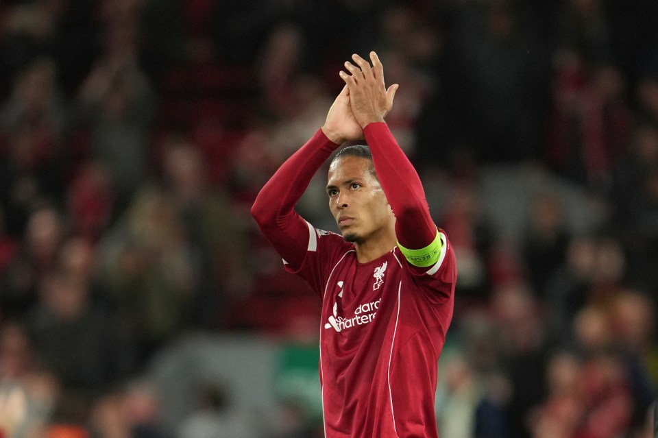 Liverpool's Virgil van Dijk waves to supporters.