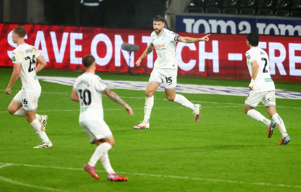 Cameron Burgess of Swansea City celebrates scoring a goal against Nottingham Forest.