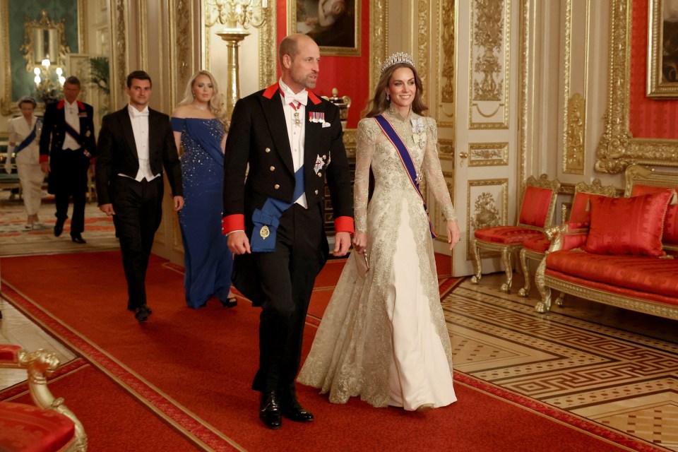 Britain's William, Prince of Wales and Catherine, Princess of Wales walking to attend the State Banquet during U.S. President Donald Trump's state visit.