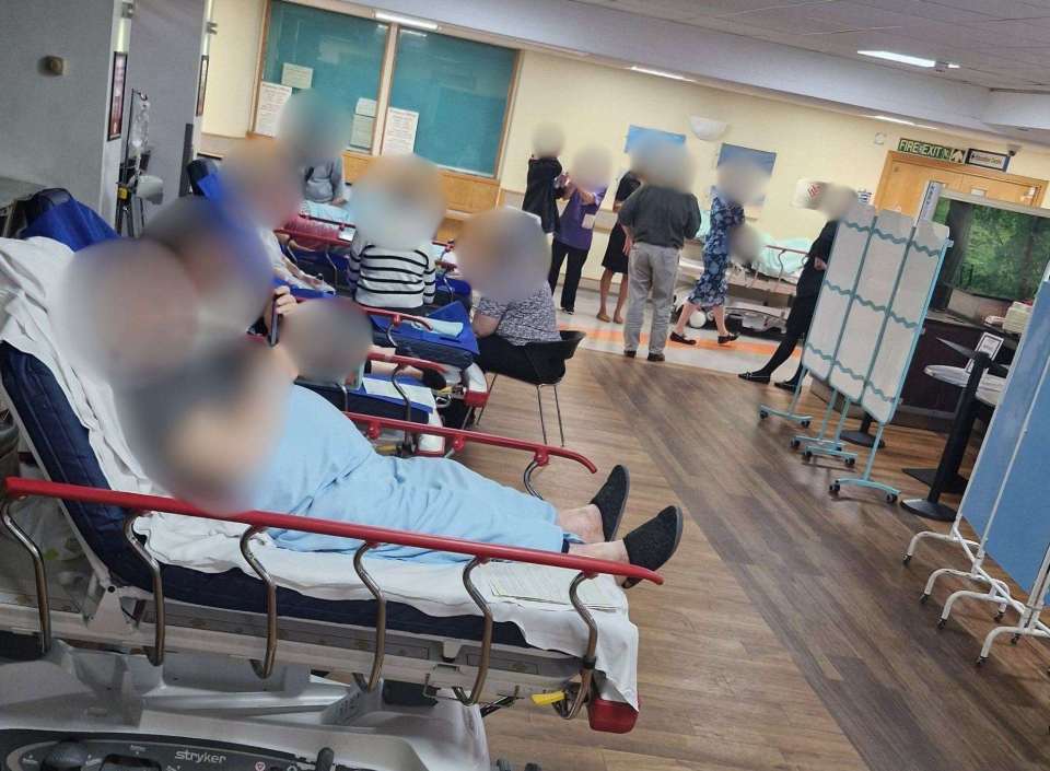 Patients in hospital beds in a closed café.
