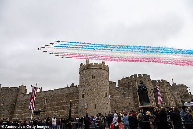 Red Arrows fly over Windsor Castle in honour of US President Donald Trump