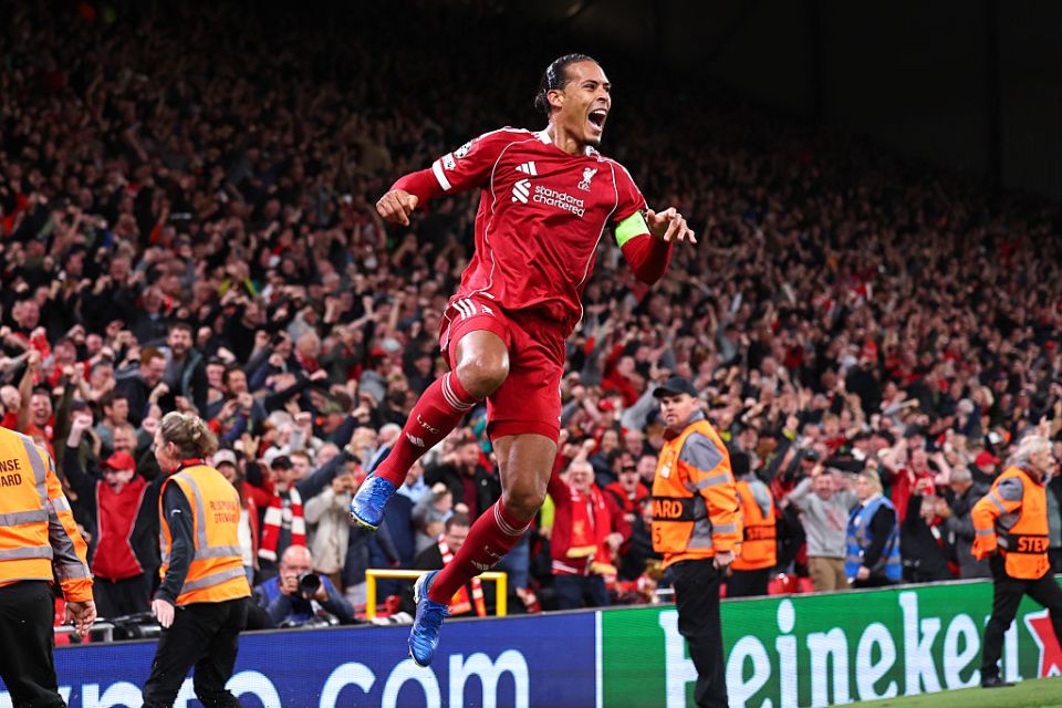 LIVERPOOL, ENGLAND - SEPTEMBER 17: Virgil van Dijk of Liverpool celebrates after scoring a goal to make it 3-2 during the UEFA Champions League 2025/26 League Phase MD1 match between Liverpool FC and Atletico de Madrid at Anfield on September 17, 2025 in Liverpool, England. (Photo by Robbie Jay Barratt - AMA/Getty Images)