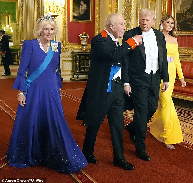 A source close to the First Lady has confirmed to the Daily Mail that her Carolina Herrera dress was 'buttercream yellow' with an 'Easter purple' belt