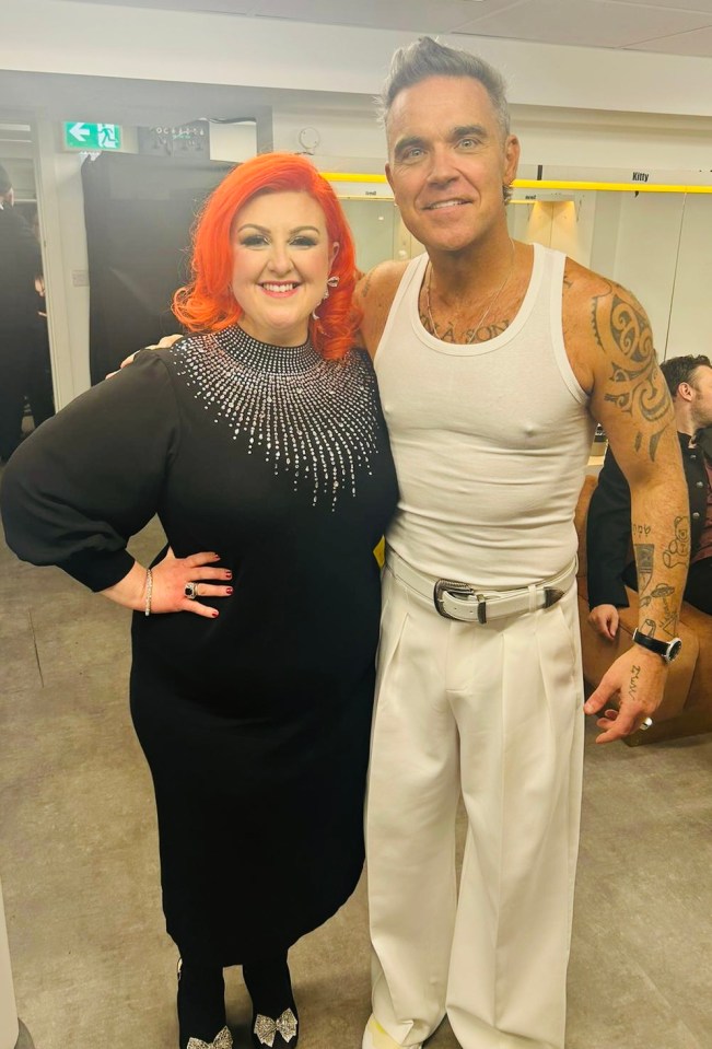 Michelle McManus with Robbie Williams.