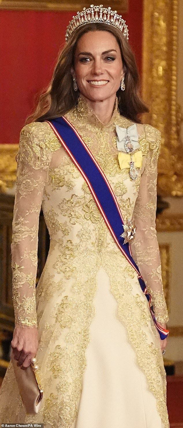 Kate Middleton (pictured) sported a Phillipa Lepley silk crepe gown underneath a hand-embroidered gold Chantilly lace evening coat