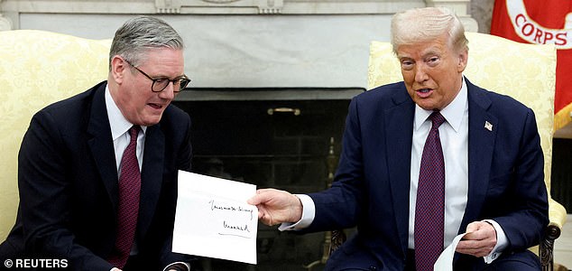 FILE PHOTO: U.S. President Donald Trump holds a letter from Britain's King Charles as he meets with British Prime Minister Keir Starmer in the Oval Office at the White House in Washington, D.C., U.S., February 27, 2025. REUTERS/Kevin Lamarque/File Photo