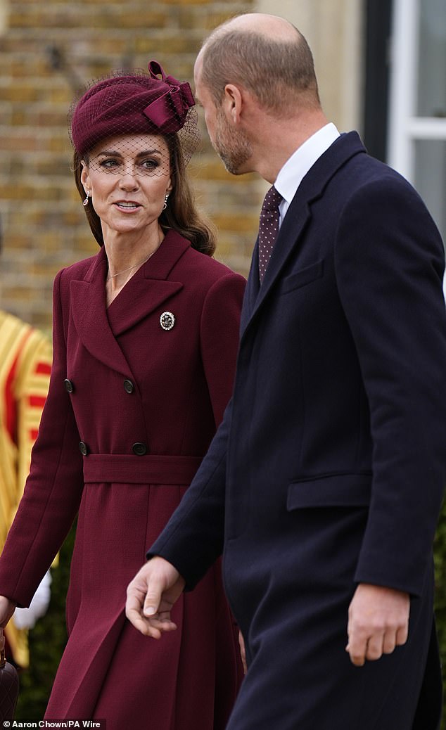 The Prince of Wales opted for a simple yet classic suit with a long-line coat, but made sure to pick a tie that matched Kate's dress
