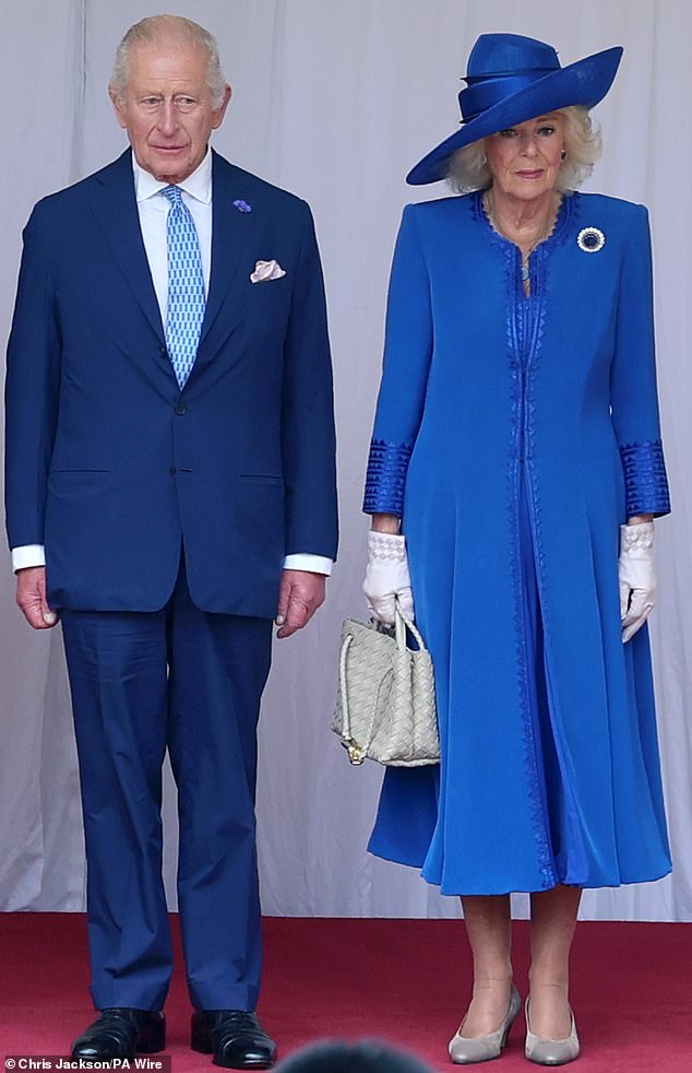 King Charles coordinated with the Queen Consort's sapphire number with a blue-patterned tie from Greek brand Thalassa Collection. The thoughtful selection could be a subtle salute to his father, Prince Phillip's Greek heritage