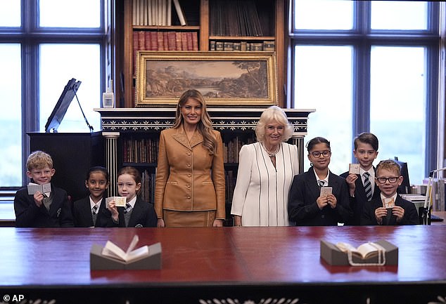 Melania Trump and Queen Camilla visit the Royal Library at Windsor Castle this morning